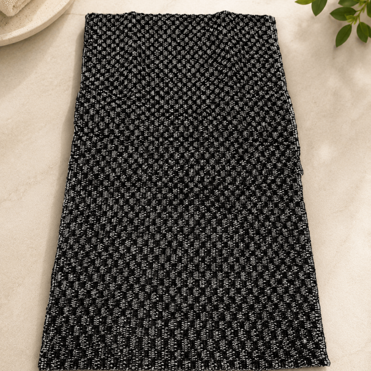 Svart exfolierande skrubbhandduk 120 cm